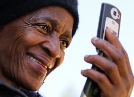 poor person and cell phone